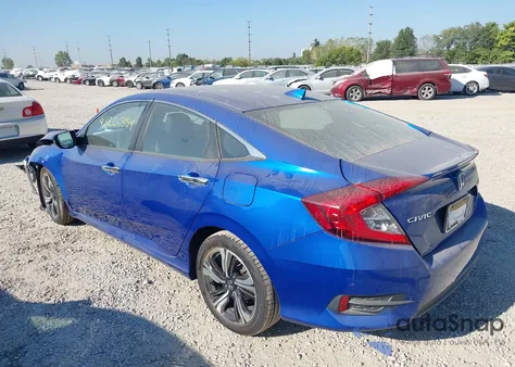 2016 Honda Civic Touring z USA, uszkodzony, nr VIN 19XFC1F97GE023385